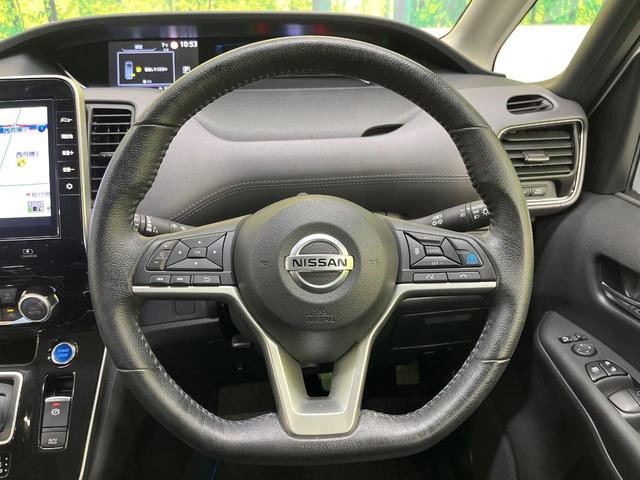 セレナ ｅ－パワー　ハイウェイスターＶ　純正１０型ナビ　後席モニター　全周囲カメラ　両側電動ドア　セーフティパックＡ　リアオートエアコン　純正１６インチＡＷ　衝突被害軽減システム　プロパイロット　禁煙車　スマートキー　ＬＥＤヘッド　ＥＴＣ（12枚目）