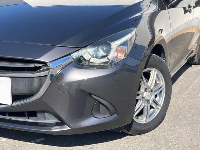 デミオ １３Ｓ　メーカーナビ　バックカメラ　ＣＤ／ＤＶＤ　Ｂｌｕｅｔｏｏｔｈ　シートヒーター　禁煙車　ＢＳＭ　ＬＥＤヘッドライト　ＥＴＣ　スマートキー　オートエアコン　オートライト（12枚目）