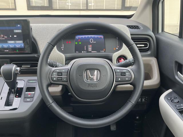 フリード エアー　ＥＸ　純正８型ディスプレイオーディオ　バックカメラ　登録済未使用車　両側電動ドア　ホンダセンシング　レーダークルーズ　ハーフレザーシート　シートヒーター　コーナーセンサー　スマートキー　ＬＥＤヘッド（12枚目）