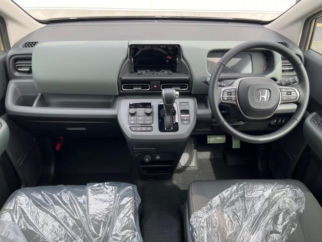 フリード ｅ：ＨＥＶクロスター　登録済未使用車　ホンダセンシング　アダプティブクルーズコントロール　シートヒーター　両側パワースライドドア　ＢＳＭ　電動パーキングブレーキ　ＬＥＤヘッドライト　オートライト　スマートキー（2枚目）