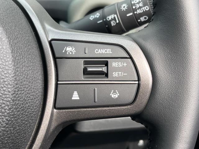 フリード ｅ：ＨＥＶクロスター　登録済未使用車　ホンダセンシング　アダプティブクルーズコントロール　シートヒーター　両側パワースライドドア　ＢＳＭ　電動パーキングブレーキ　ＬＥＤヘッドライト　オートライト　スマートキー（32枚目）