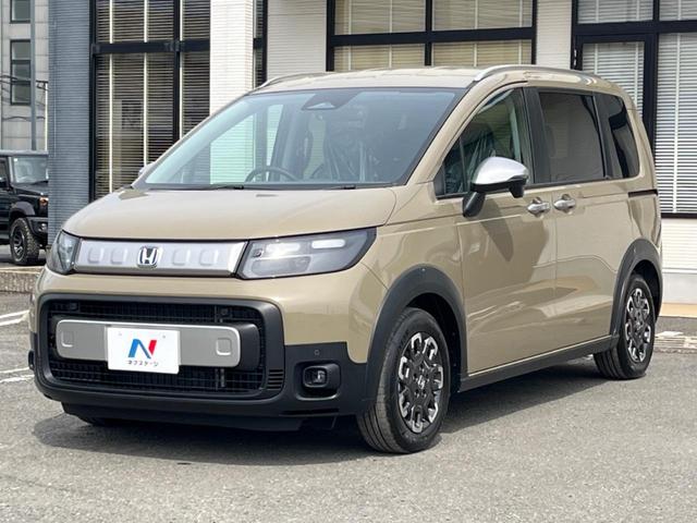 フリード ｅ：ＨＥＶクロスター　登録済未使用車　ホンダセンシング　アダプティブクルーズコントロール　シートヒーター　両側パワースライドドア　ＢＳＭ　電動パーキングブレーキ　ＬＥＤヘッドライト　オートライト　スマートキー（54枚目）