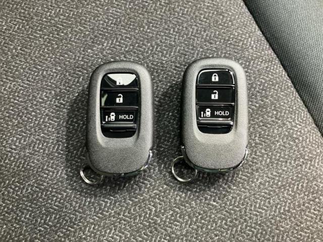 N-BOXカスタム ヒョウジュン 純正 8インチ ナビ/ホンダセンシング/電動スライドドア/シートヒーター 前席/車線逸脱防止支援システム/登録済未使用車/ヘッドランプ LED/Bluetooth接続/バックモニター/フルセグTV(35枚目)