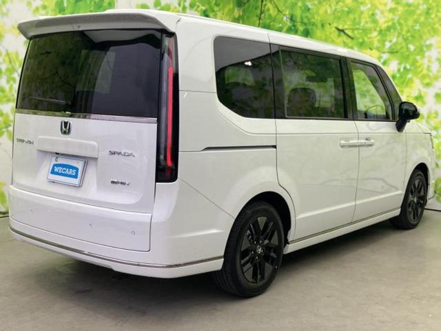 ステップワゴン ｅＨＥＶスパーダ　保証書／純正　１１インチ　ナビ／フリップダウンモニター　純正　１５．６インチ／ホンダセンシング／両側電動スライドドア／シートヒーター　前席／車線逸脱防止支援システム／電動バックドア／登録済未使用車（3枚目）