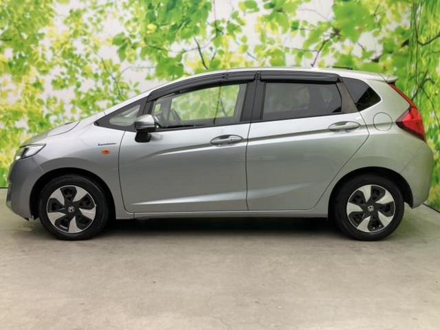 フィットハイブリッド ハイブリッド　新品タイヤ／保証書／ＥＴＣ／ＥＢＤ付ＡＢＳ／横滑り防止装置／アイドリングストップ／パワーウインドウ／エンジンスタートボタン／オートエアコン／パワーステアリング／盗難防止システム／ＵＶカットガラス（2枚目）