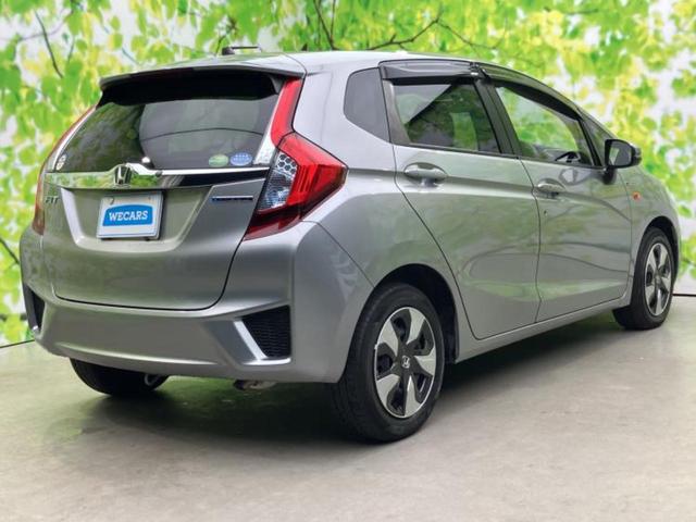 フィットハイブリッド ハイブリッド　新品タイヤ／保証書／ＥＴＣ／ＥＢＤ付ＡＢＳ／横滑り防止装置／アイドリングストップ／パワーウインドウ／エンジンスタートボタン／オートエアコン／パワーステアリング／盗難防止システム／ＵＶカットガラス（3枚目）