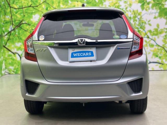 フィットハイブリッド ハイブリッド　新品タイヤ／保証書／ＥＴＣ／ＥＢＤ付ＡＢＳ／横滑り防止装置／アイドリングストップ／パワーウインドウ／エンジンスタートボタン／オートエアコン／パワーステアリング／盗難防止システム／ＵＶカットガラス（35枚目）
