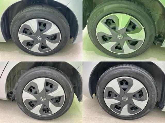 フィットハイブリッド ハイブリッド　新品タイヤ／保証書／ＥＴＣ／ＥＢＤ付ＡＢＳ／横滑り防止装置／アイドリングストップ／パワーウインドウ／エンジンスタートボタン／オートエアコン／パワーステアリング／盗難防止システム／ＵＶカットガラス（42枚目）