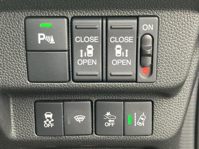 フリード Gホンダセンシング 新品タイヤ/保証書/純正 SDナビ/フリップダウンモニター 純正 9インチ/ホンダセンシング/両側電動スライドドア/車線逸脱防止支援システム/シート ハーフレザー/ヘッドランプ LED バックカメラ(30枚目)