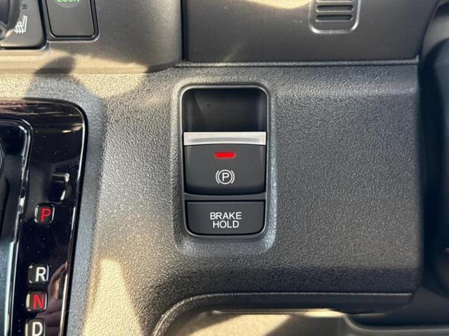 N-BOXカスタム ターボコーディネートスタイル2トーン 純正 9インチ ナビ/ホンダセンシング/両側電動スライドドア/シートヒーター 前席/マルチビューカメラシステム/車線逸脱防止支援システム/シート 合皮/届出済未使用車/ヘッドランプ LED 禁煙車(27枚目)