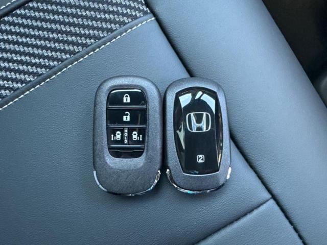 N-BOXカスタム ターボコーディネートスタイル2トーン 純正 9インチ ナビ/ホンダセンシング/両側電動スライドドア/シートヒーター 前席/マルチビューカメラシステム/車線逸脱防止支援システム/シート 合皮/届出済未使用車/ヘッドランプ LED 禁煙車(32枚目)