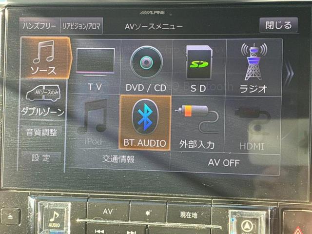 ヴェルファイア ＺＧ　サンルーフ／純正エアロ／保証書／社外　１１インチ　ＳＤナビ／フリップダウンモニター　社外　１２．８インチ／衝突安全装置／両側電動スライドドア／シートヒーター　前席／車線逸脱防止支援システム　革シート（10枚目）