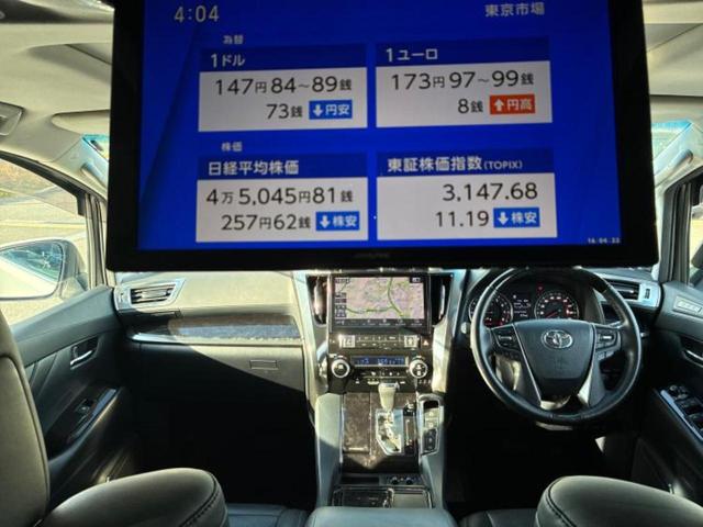 ヴェルファイア ＺＧ　サンルーフ／純正エアロ／保証書／社外　１１インチ　ＳＤナビ／フリップダウンモニター　社外　１２．８インチ／衝突安全装置／両側電動スライドドア／シートヒーター　前席／車線逸脱防止支援システム　革シート（26枚目）