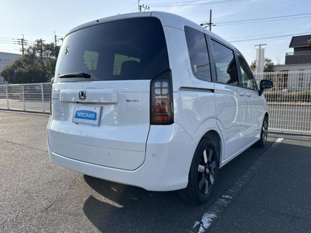 フリード ｅＨＥＶエアーＥＸ　保証書／純正　１１インチ　ナビ／ホンダセンシング／両側電動スライドドア／シートヒーター　前席／車線逸脱防止支援システム／登録済未使用車／ヘッドランプ　ＬＥＤ／Ｂｌｕｅｔｏｏｔｈ接続／ＥＢＤ付ＡＢＳ（3枚目）