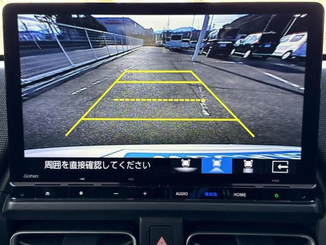 フリード ｅＨＥＶエアーＥＸ　保証書／純正　１１インチ　ナビ／ホンダセンシング／両側電動スライドドア／シートヒーター　前席／車線逸脱防止支援システム／登録済未使用車／ヘッドランプ　ＬＥＤ／Ｂｌｕｅｔｏｏｔｈ接続／ＥＢＤ付ＡＢＳ（13枚目）