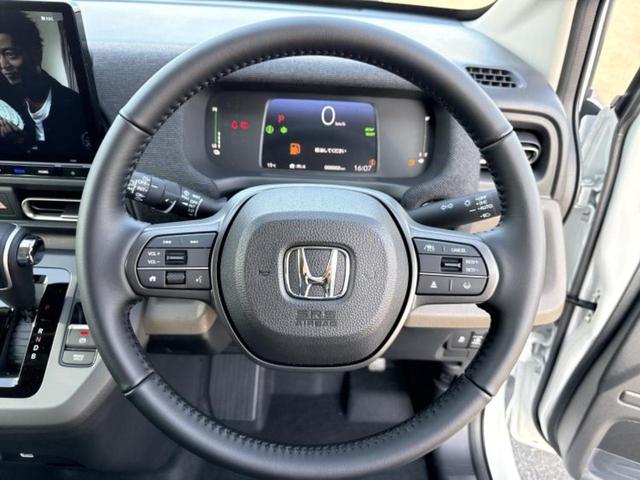 フリード ｅＨＥＶエアーＥＸ　保証書／純正　１１インチ　ナビ／ホンダセンシング／両側電動スライドドア／シートヒーター　前席／車線逸脱防止支援システム／登録済未使用車／ヘッドランプ　ＬＥＤ／Ｂｌｕｅｔｏｏｔｈ接続／ＥＢＤ付ＡＢＳ（15枚目）