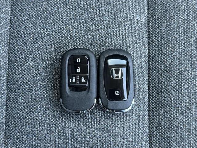 フリード ｅＨＥＶエアーＥＸ　保証書／純正　１１インチ　ナビ／ホンダセンシング／両側電動スライドドア／シートヒーター　前席／車線逸脱防止支援システム／登録済未使用車／ヘッドランプ　ＬＥＤ／Ｂｌｕｅｔｏｏｔｈ接続／ＥＢＤ付ＡＢＳ（35枚目）