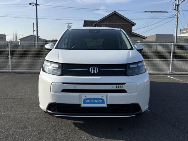 フリード ｅＨＥＶエアーＥＸ　保証書／純正　１１インチ　ナビ／ホンダセンシング／両側電動スライドドア／シートヒーター　前席／車線逸脱防止支援システム／登録済未使用車／ヘッドランプ　ＬＥＤ／Ｂｌｕｅｔｏｏｔｈ接続／ＥＢＤ付ＡＢＳ（45枚目）