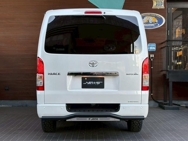 ハイエースバン スーパーＧＬ　ダークプライムＩＩ　新車未登録　８型　ダークプライムＩＩ　ナビＴＶ　全方位カメラ　トヨタセーフティセンス　両側電動スライドドア　黒木目コンビステアリング　ＪＡＯＳ前後スキッドバー　ナイトロパワー艶消黒１６ＡＷ（9枚目）