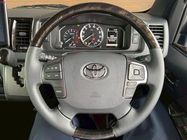 ハイエースバン スーパーＧＬ　ダークプライムＩＩ　新車未登録　８型　ダークプライムＩＩ　ナビＴＶ　全方位カメラ　トヨタセーフティセンス　両側電動スライドドア　黒木目コンビステアリング　ＪＡＯＳ前後スキッドバー　ナイトロパワー艶消黒１６ＡＷ（21枚目）