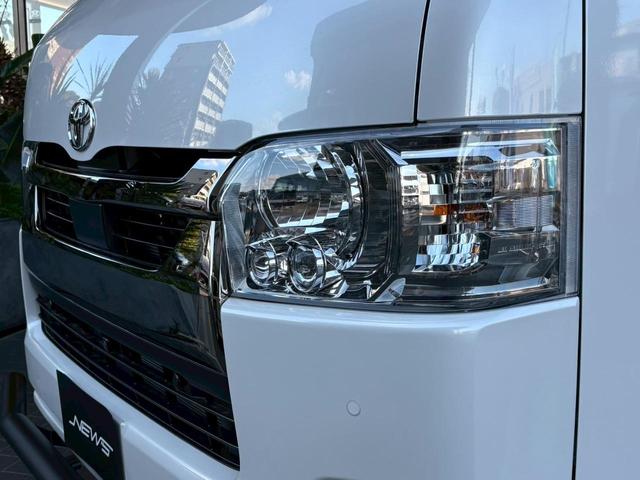 ハイエースバン スーパーＧＬ　ダークプライムＩＩ　新車未登録　８型　ダークプライムＩＩ　ナビＴＶ　全方位カメラ　トヨタセーフティセンス　両側電動スライドドア　黒木目コンビステアリング　ＪＡＯＳ前後スキッドバー　ナイトロパワー艶消黒１６ＡＷ（56枚目）