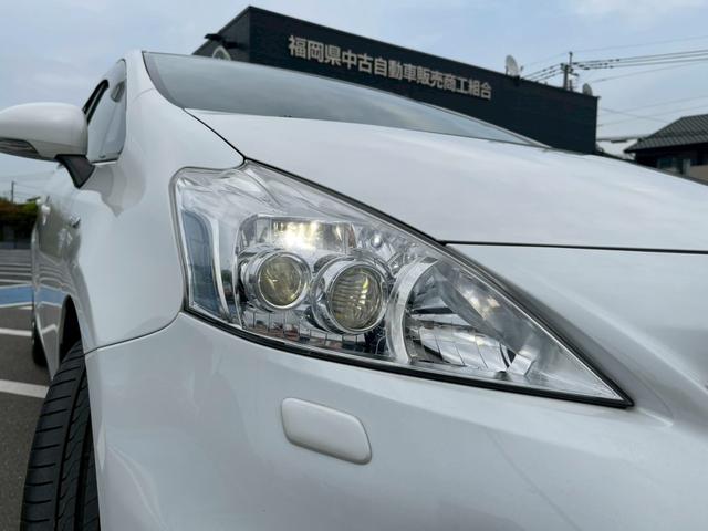 プリウスアルファ Ｇ　純正ナビ　フルセグＴＶ　スマ－トキ－　定期点検記録簿　禁煙車　ＬＥＤヘッドランプ　ステアリングリモコン　本革巻ステアリング　社外アルミ１７インチ　オートライト　オートマチックハイビーム　盗難防止（13枚目）