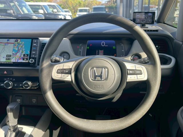 フィット e:HEVクロスター 障害物センサー 禁煙車 レーンアシスト レーダークルーズコントロール 前後ドラレコ ETC 9インチナビ スマートキー フラットシート LEDヘッドランプ 純正16インチアルミホイール バックカメラ(3枚目)