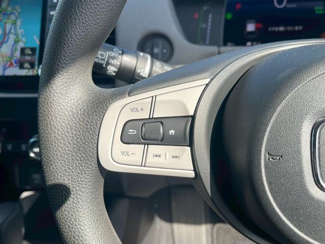 フィット e:HEVクロスター 障害物センサー 禁煙車 レーンアシスト レーダークルーズコントロール 前後ドラレコ ETC 9インチナビ スマートキー フラットシート LEDヘッドランプ 純正16インチアルミホイール バックカメラ(7枚目)