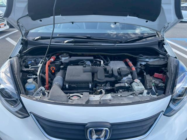 フィット e:HEVクロスター 障害物センサー 禁煙車 レーンアシスト レーダークルーズコントロール 前後ドラレコ ETC 9インチナビ スマートキー フラットシート LEDヘッドランプ 純正16インチアルミホイール バックカメラ(16枚目)