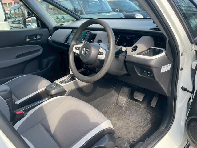 フィット e:HEVクロスター 障害物センサー 禁煙車 レーンアシスト レーダークルーズコントロール 前後ドラレコ ETC 9インチナビ スマートキー フラットシート LEDヘッドランプ 純正16インチアルミホイール バックカメラ(29枚目)