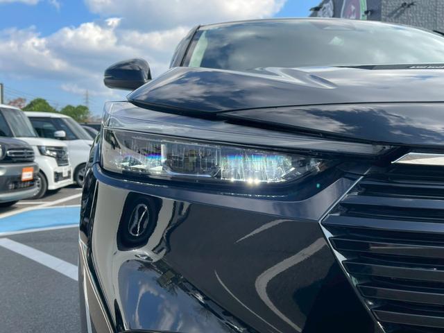 ヴェゼル ｅ：ＨＥＶ　Ｚ　禁煙車　ＢＳＭ　障害物センサー　全周囲カメラ　フルセグＴＶ　純正９インチナビ　シートヒーター　前後ドラレコ　ＥＴＣ　スマートキー　ハーフレザーシート　電動リアゲート　フロントフォグランプ　純正アルミ（17枚目）