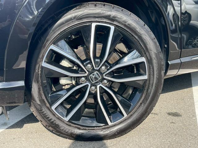 ヴェゼル ｅ：ＨＥＶ　Ｚ　禁煙車　ＢＳＭ　障害物センサー　全周囲カメラ　フルセグＴＶ　純正９インチナビ　シートヒーター　前後ドラレコ　ＥＴＣ　スマートキー　ハーフレザーシート　電動リアゲート　フロントフォグランプ　純正アルミ（21枚目）