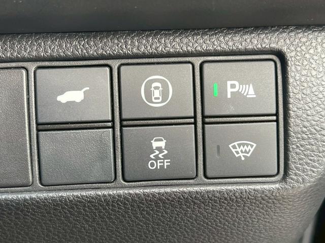 ヴェゼル ｅ：ＨＥＶ　Ｚ　禁煙車　ＢＳＭ　障害物センサー　全周囲カメラ　フルセグＴＶ　純正９インチナビ　シートヒーター　前後ドラレコ　ＥＴＣ　スマートキー　ハーフレザーシート　電動リアゲート　フロントフォグランプ　純正アルミ（31枚目）