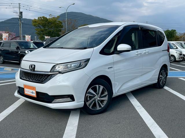 フリードハイブリッド ハイブリッド・Ｇホンダセンシング　禁煙　純正９インチナビ　　前後ドラレコ　フルセグＴＶ　レーダークルーズコントロール　　バックカメラ　ＥＴＣクリアランスソナー　　スマートキー　３列シート　両側電動スライドドア　ワンオーナ－（6枚目）