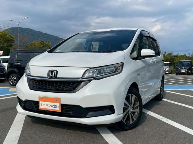 フリードハイブリッド ハイブリッド・Ｇホンダセンシング　禁煙　純正９インチナビ　　前後ドラレコ　フルセグＴＶ　レーダークルーズコントロール　　バックカメラ　ＥＴＣクリアランスソナー　　スマートキー　３列シート　両側電動スライドドア　ワンオーナ－（7枚目）
