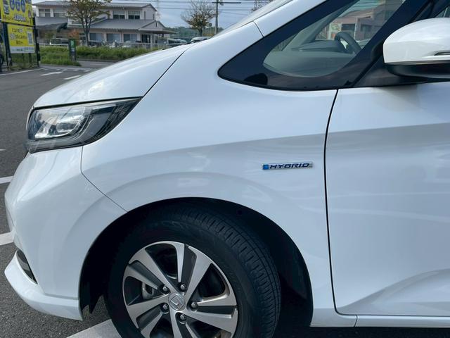 フリードハイブリッド ハイブリッド・Ｇホンダセンシング　禁煙　純正９インチナビ　　前後ドラレコ　フルセグＴＶ　レーダークルーズコントロール　　バックカメラ　ＥＴＣクリアランスソナー　　スマートキー　３列シート　両側電動スライドドア　ワンオーナ－（13枚目）
