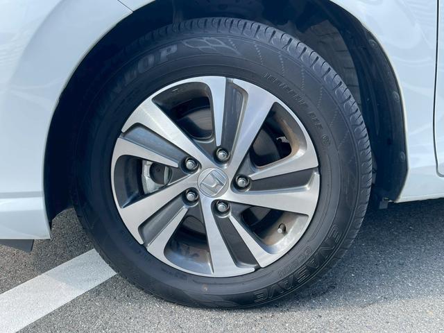 フリードハイブリッド ハイブリッド・Ｇホンダセンシング　禁煙　純正９インチナビ　　前後ドラレコ　フルセグＴＶ　レーダークルーズコントロール　　バックカメラ　ＥＴＣクリアランスソナー　　スマートキー　３列シート　両側電動スライドドア　ワンオーナ－（20枚目）