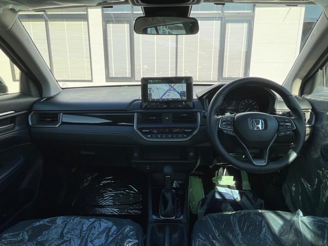 WR-V Z 登録済未使用車 純正8型ナビ バックカメラ ホンダセンシング レーダークルーズ ハーフレザーシート コーナーセンサー スマートキー LEDヘッド オートハイビーム 純正17インチAW 革巻きハンドル(2枚目)