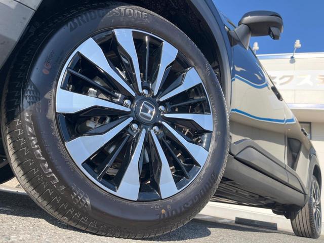 WR-V Z 登録済未使用車 純正8型ナビ バックカメラ ホンダセンシング レーダークルーズ ハーフレザーシート コーナーセンサー スマートキー LEDヘッド オートハイビーム 純正17インチAW 革巻きハンドル(13枚目)