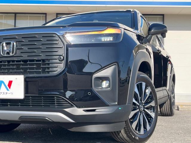 WR-V Z 登録済未使用車 純正8型ナビ バックカメラ ホンダセンシング レーダークルーズ ハーフレザーシート コーナーセンサー スマートキー LEDヘッド オートハイビーム 純正17インチAW 革巻きハンドル(26枚目)