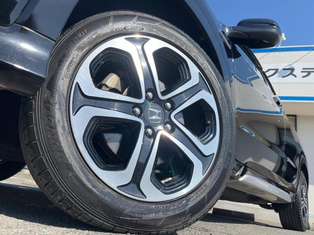 ヴェゼル ハイブリッドZ・ホンダセンシング 9インチナビ バックカメラ ホンダセンシング レーダークルーズ 禁煙車 ハーフレザーシート ドラレコ スマートキー LEDヘッド ルーフレール ETC オートライト 純正17インチアルミホイール(14枚目)