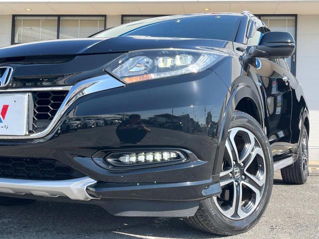 ヴェゼル ハイブリッドZ・ホンダセンシング 9インチナビ バックカメラ ホンダセンシング レーダークルーズ 禁煙車 ハーフレザーシート ドラレコ スマートキー LEDヘッド ルーフレール ETC オートライト 純正17インチアルミホイール(26枚目)