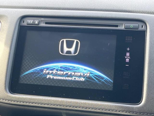 ヴェゼル ハイブリッドＺ・ホンダセンシング　純正ＳＤナビ　バックカメラ　ホンダセンシング　レーダークルコン　禁煙車　ハーフレザーシート　シートヒーター　ドラレコ　ＬＥＤヘッド　ＥＴＣ　車線逸脱警報　オートブレーキホールド　オートライト（3枚目）