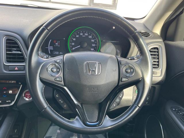 ヴェゼル ハイブリッドＺ・ホンダセンシング　純正ＳＤナビ　バックカメラ　ホンダセンシング　レーダークルコン　禁煙車　ハーフレザーシート　シートヒーター　ドラレコ　ＬＥＤヘッド　ＥＴＣ　車線逸脱警報　オートブレーキホールド　オートライト（12枚目）