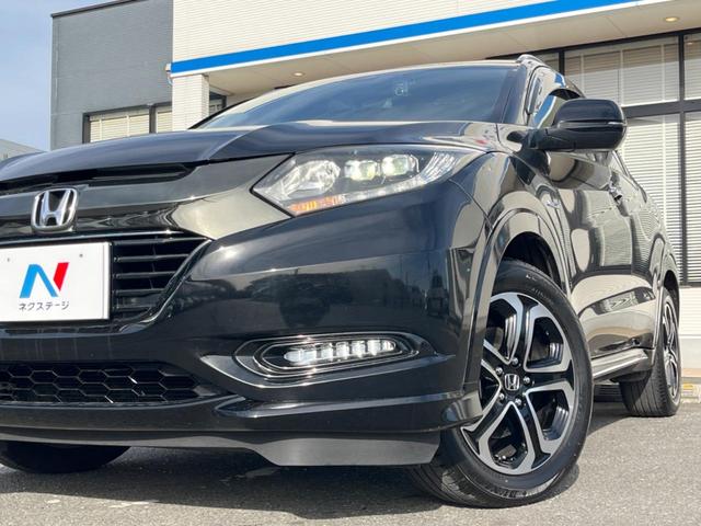 ヴェゼル ハイブリッドＺ・ホンダセンシング　純正ＳＤナビ　バックカメラ　ホンダセンシング　レーダークルコン　禁煙車　ハーフレザーシート　シートヒーター　ドラレコ　ＬＥＤヘッド　ＥＴＣ　車線逸脱警報　オートブレーキホールド　オートライト（13枚目）