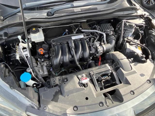 ヴェゼル ハイブリッドＺ・ホンダセンシング　純正ＳＤナビ　バックカメラ　ホンダセンシング　レーダークルコン　禁煙車　ハーフレザーシート　シートヒーター　ドラレコ　ＬＥＤヘッド　ＥＴＣ　車線逸脱警報　オートブレーキホールド　オートライト（18枚目）