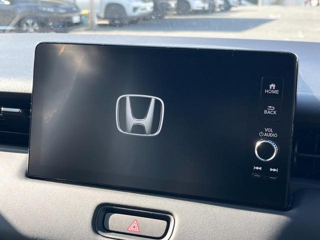 ヴェゼル ｅ：ＨＥＶ　ＲＳ　登録済未使用車　９型ホンダコネクトディスプレイ　全周囲カメラ　ホンダセンシング　アダプティブクルコン　ハンズフリーパワーバックドア　シートヒーター　コーナーセンサー　ＬＥＤヘッド　ＥＴＣ２．０（3枚目）