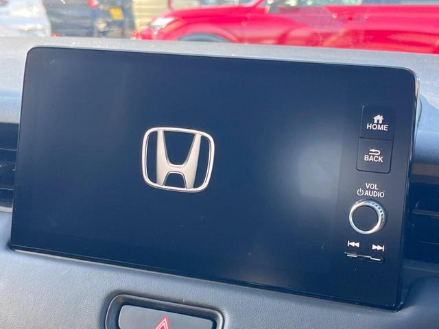 ヴェゼル ｅ：ＨＥＶ　Ｚ　純正９インチナビ　全周囲カメラ　ホンダセンシング　禁煙車　電動リアゲート　ハーフレザーシート　シートヒーター　ドラレコ　スマートキー　シーケンシャルターンランプ　ＥＴＣ２．０　純正１８インチアルミ（4枚目）