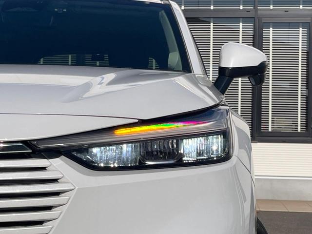 ヴェゼル ｅ：ＨＥＶ　Ｚ　純正９インチナビ　全周囲カメラ　ホンダセンシング　禁煙車　電動リアゲート　ハーフレザーシート　シートヒーター　ドラレコ　スマートキー　シーケンシャルターンランプ　ＥＴＣ２．０　純正１８インチアルミ（24枚目）