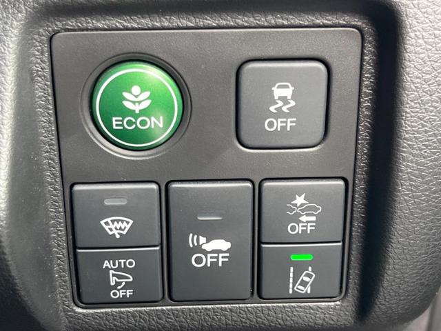 ヴェゼル ハイブリッドＲＳ・ホンダセンシング　ホンダセンシング　アダプティブクルコン　禁煙車　ハーフレザーシート　シートヒーター　スマートキー　ＬＥＤヘッド　ＥＴＣ　純正１８インチアルミ　車線逸脱警報　オートブレーキホールド　オートライト（5枚目）